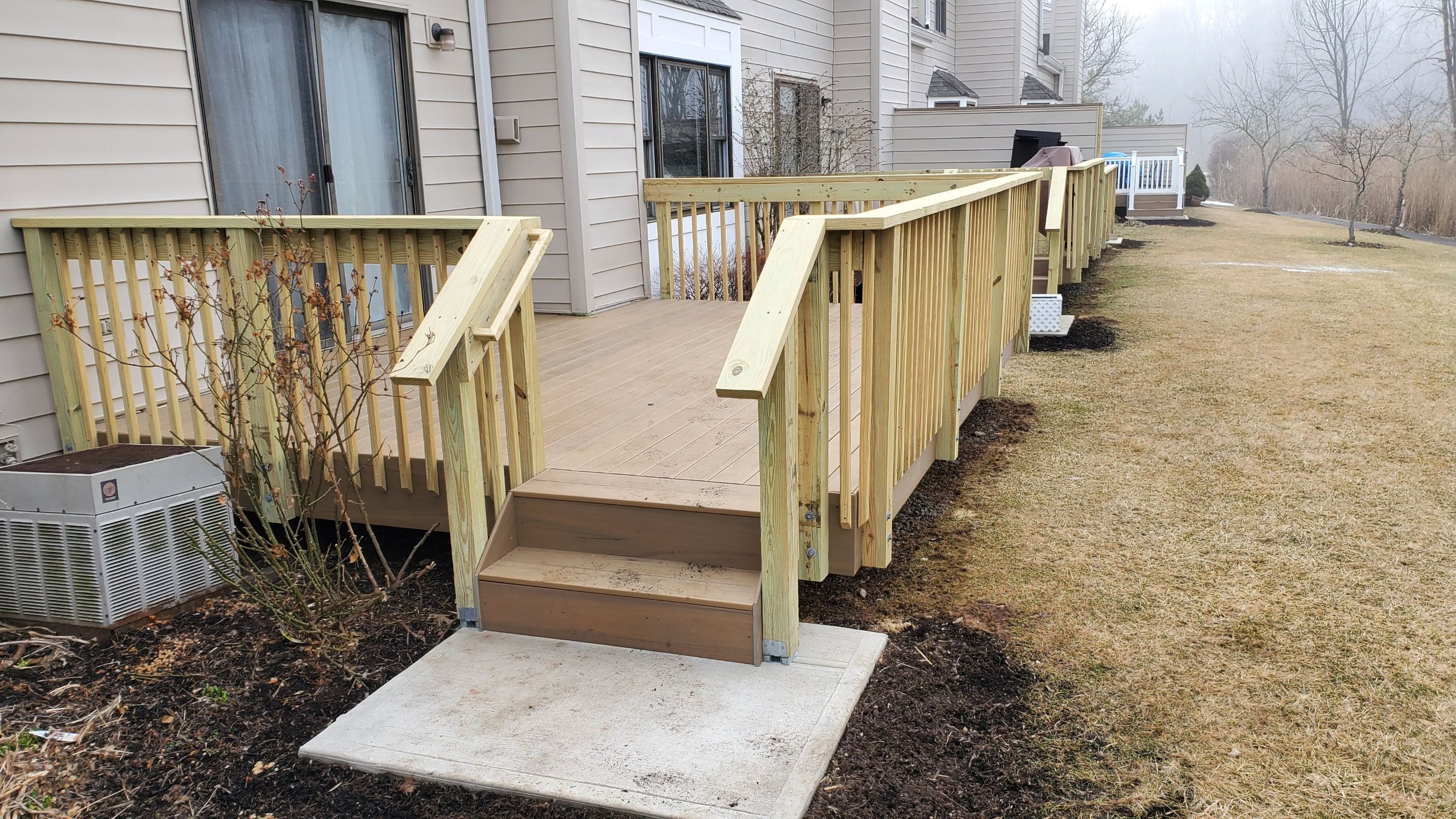 New wood stairs and deck landing