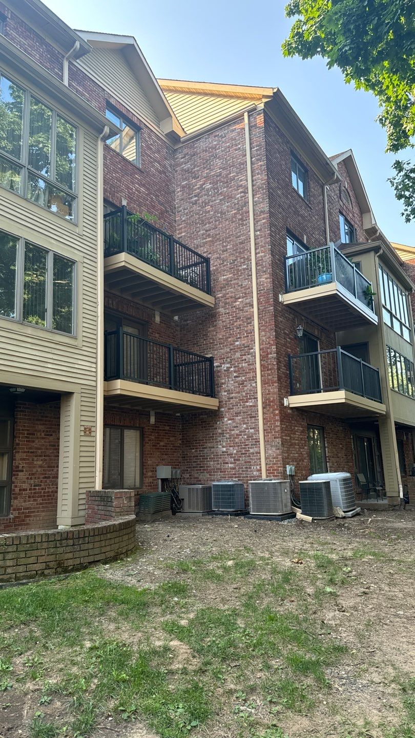 Exterior balcony repair at residential building