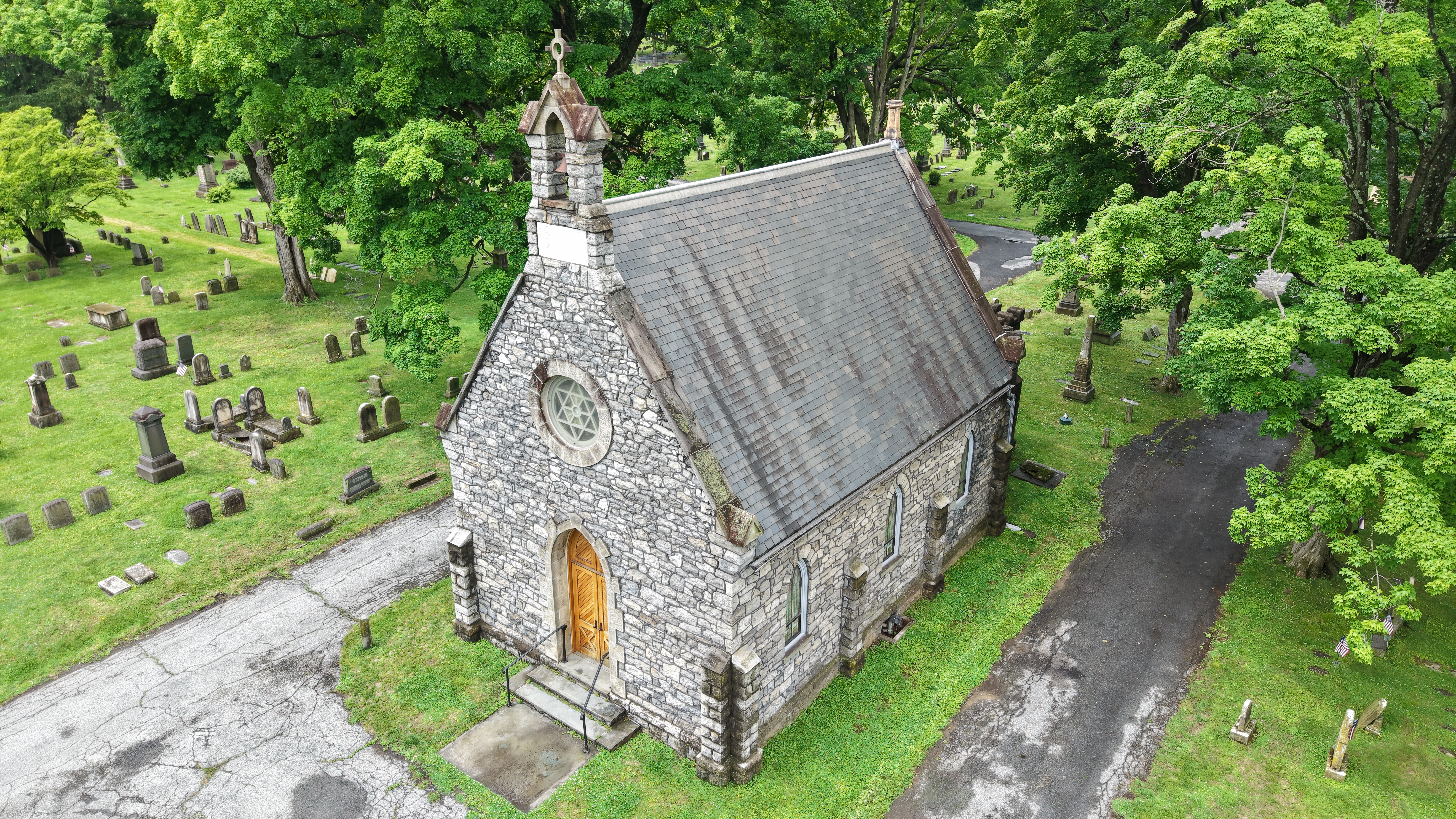 Drone view of historic stone chapel for preservation documentation