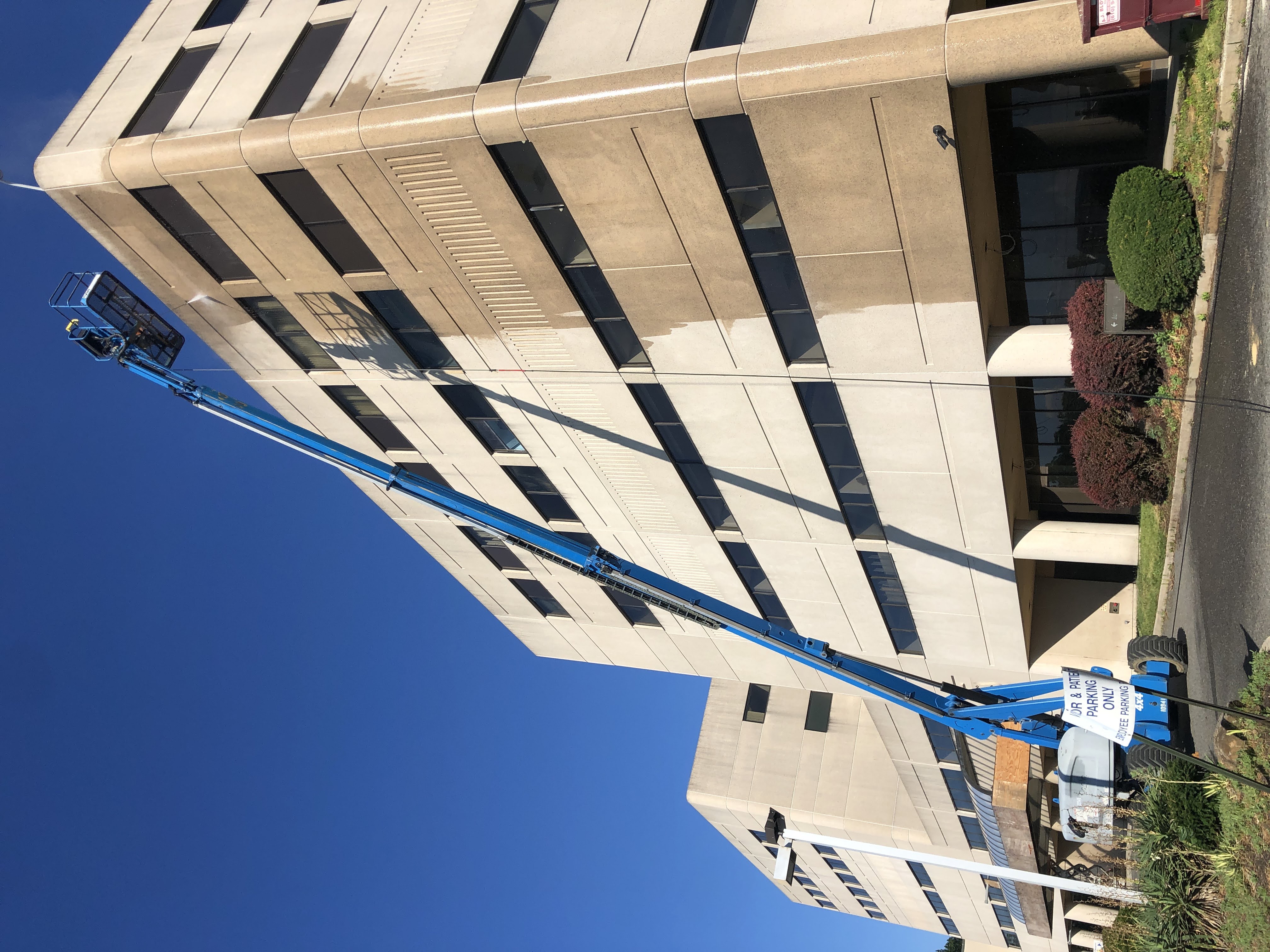 Commercial facade cleaning at height