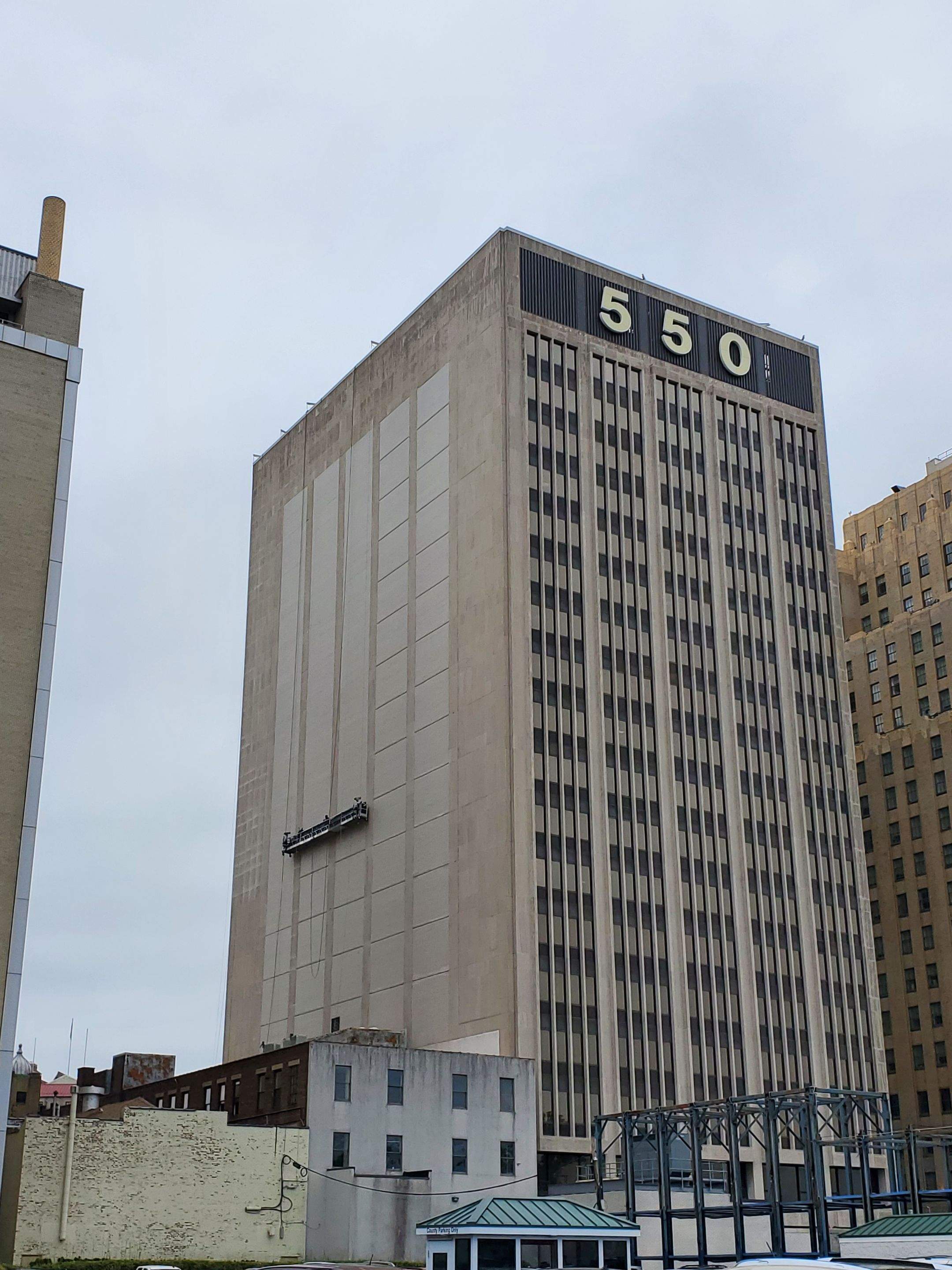 Tall commercial building masonry facade