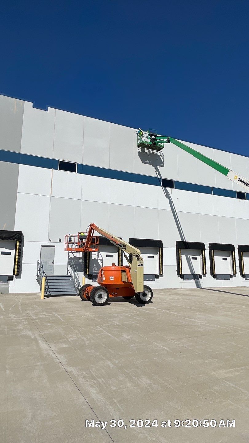 Elastomeric coating application on commercial exterior